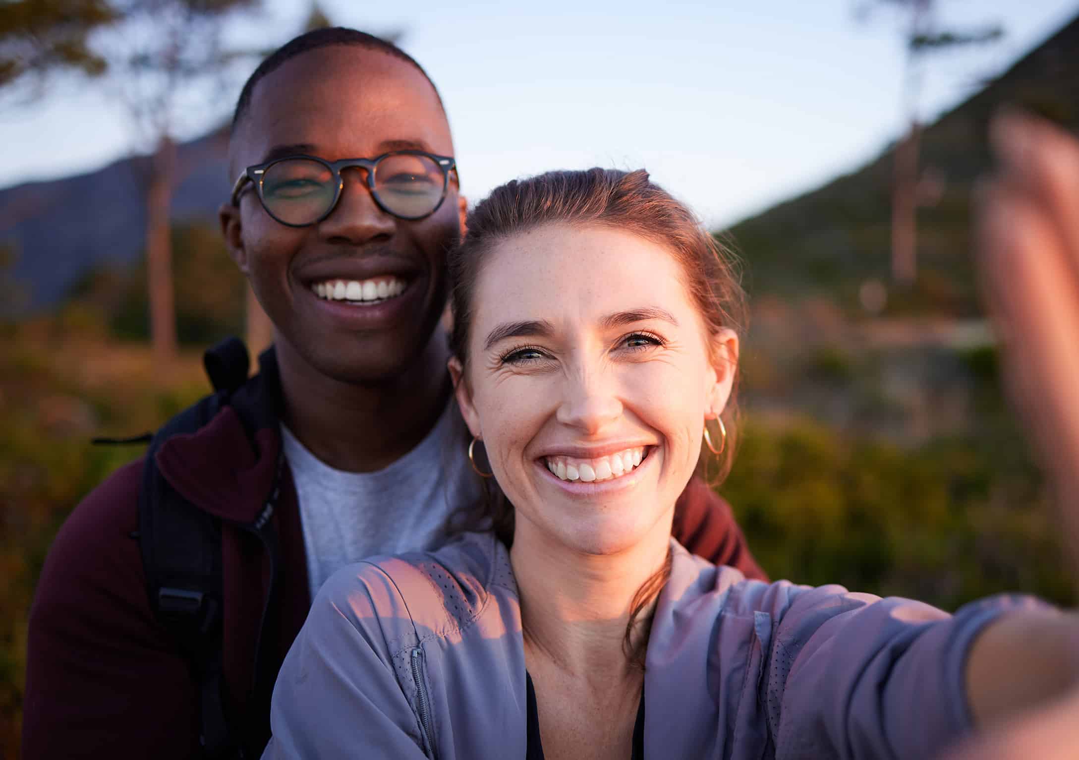 happy couple outside - Vista Peak Dental